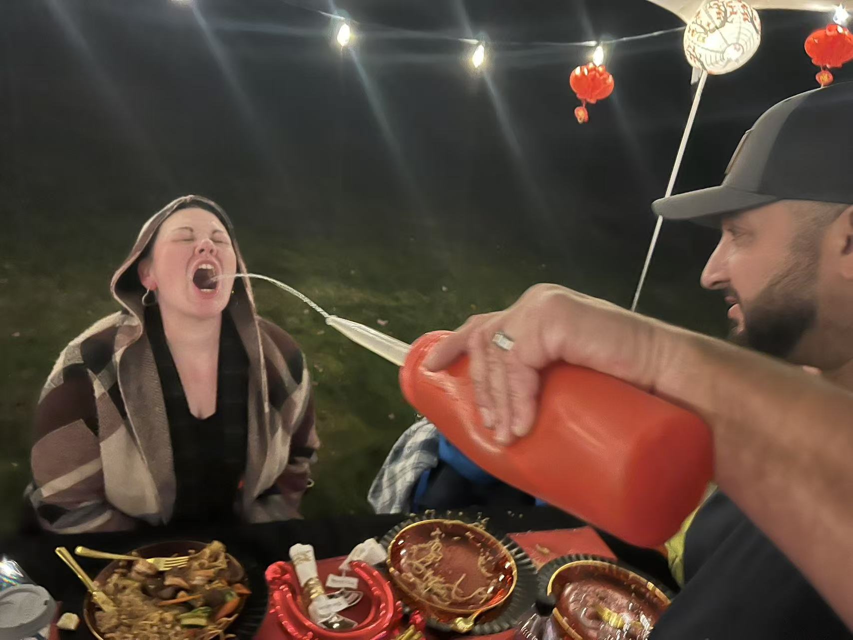 Hibachi chef performing tricks at Boston home party