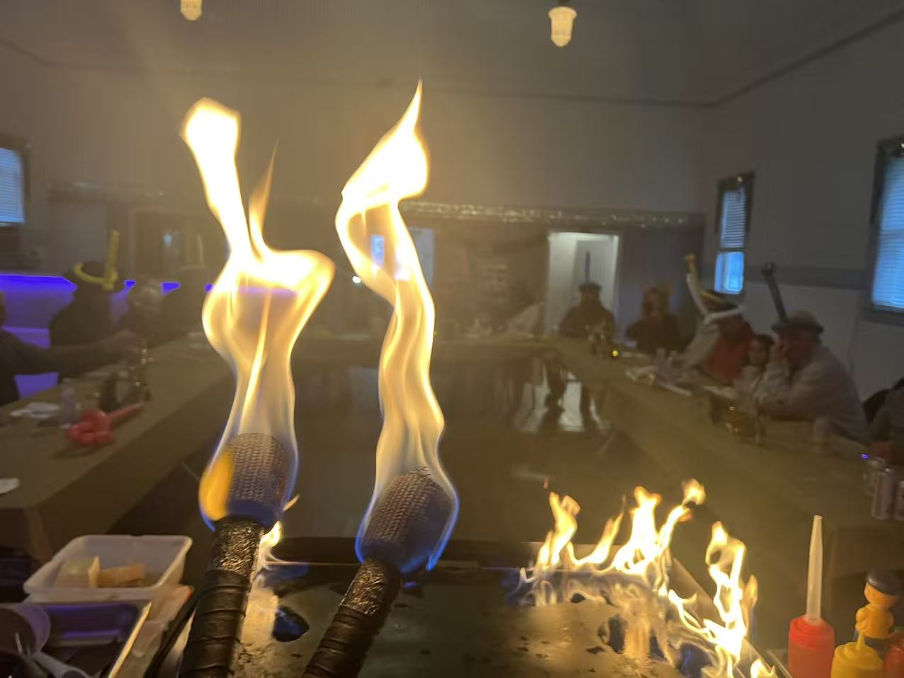 Guests enjoying hibachi catering in Boston backyard