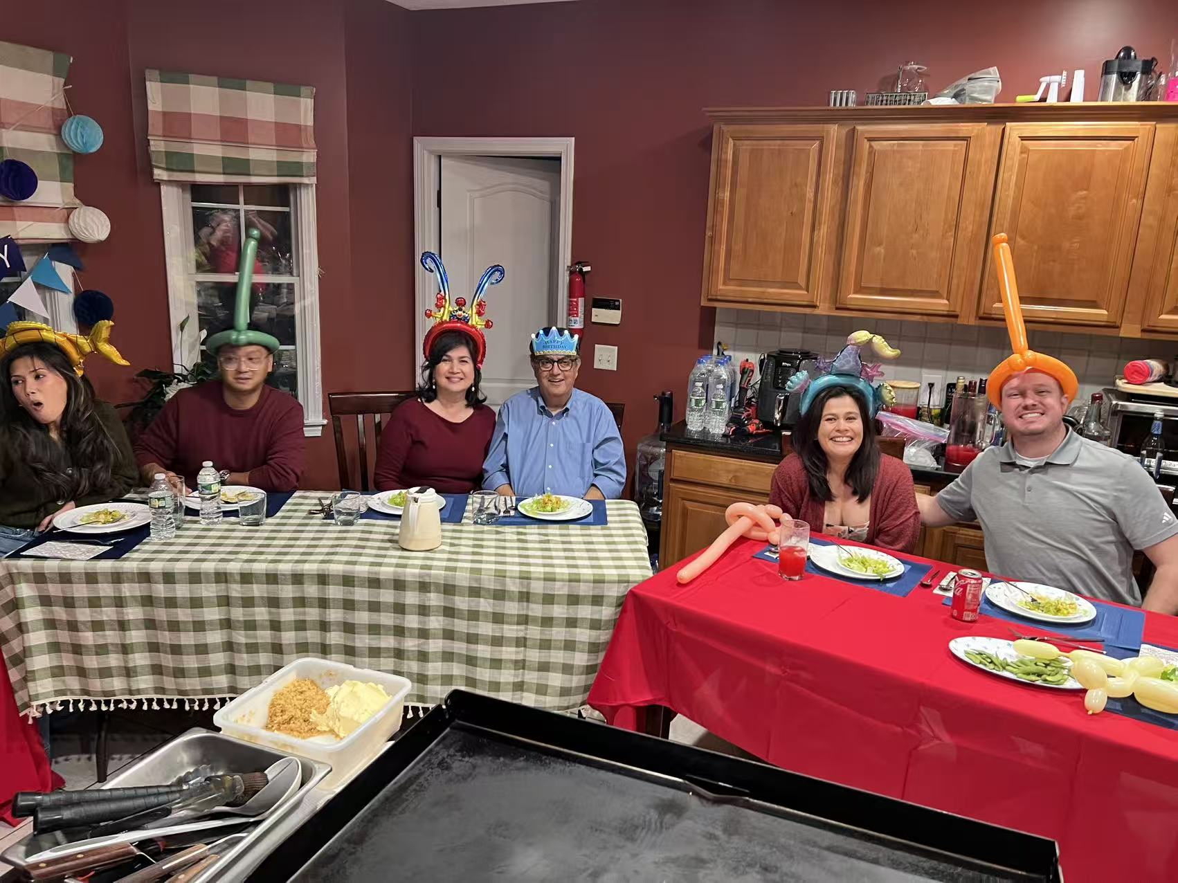 Professional hibachi chef cooking salmon and vegetables in Boston backyard