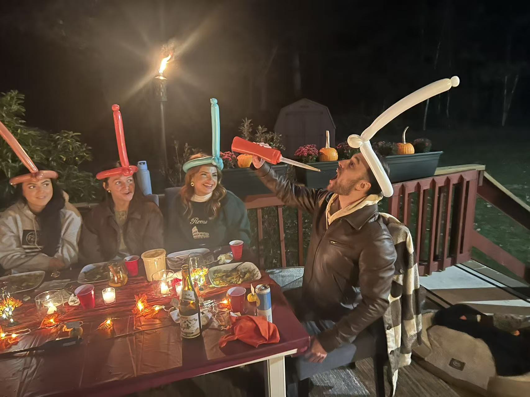 Hibachi chef performing onion volcano trick at Boston party