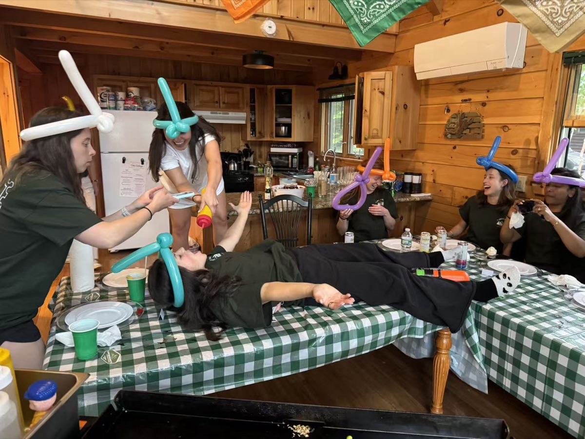 Fun hibachi party entertainment with balloon hats at a New England celebration