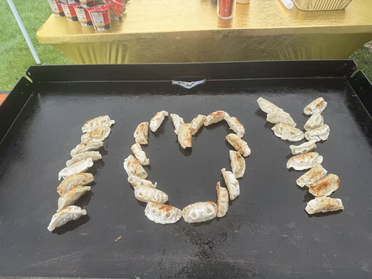 Outdoor hibachi catering event in New England backyard