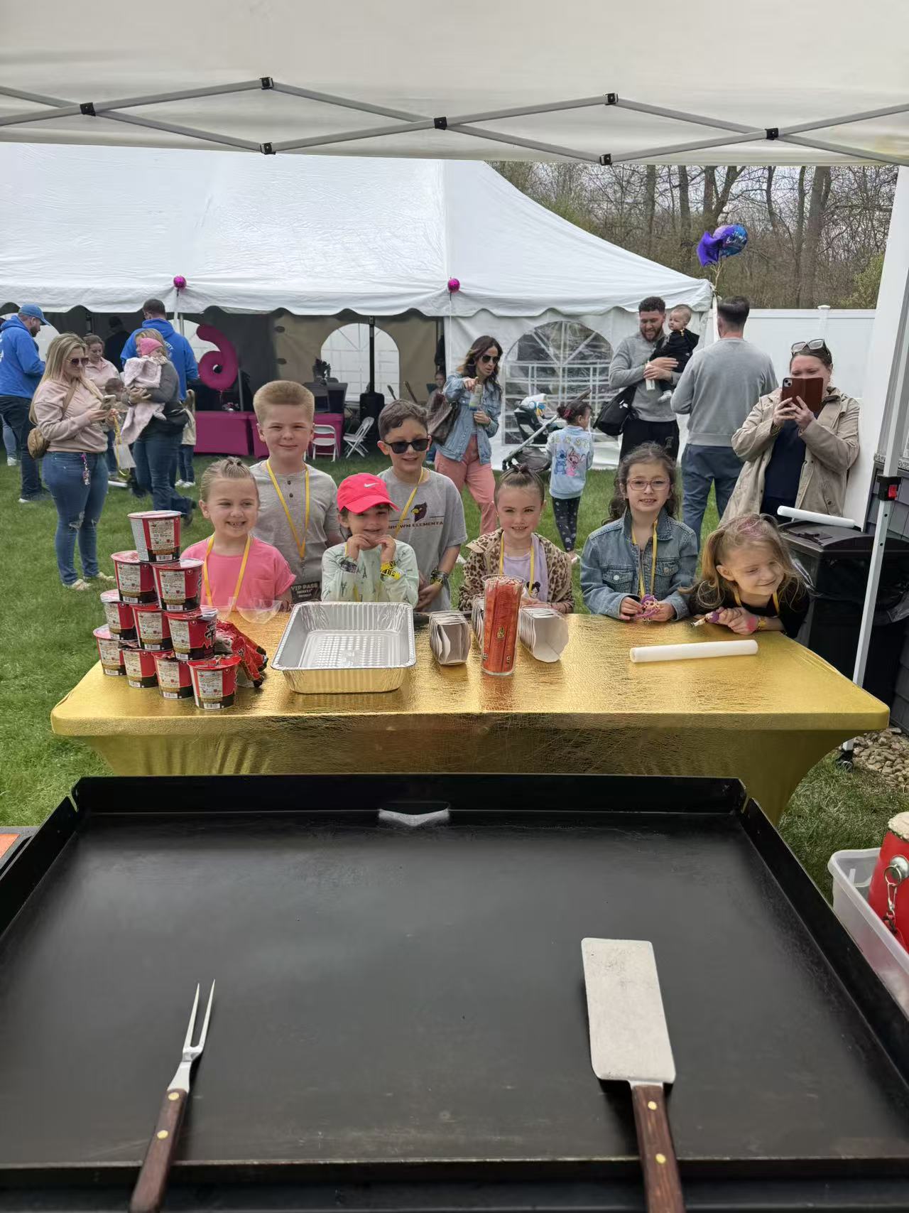 Professional hibachi chef performing knife tricks in New England